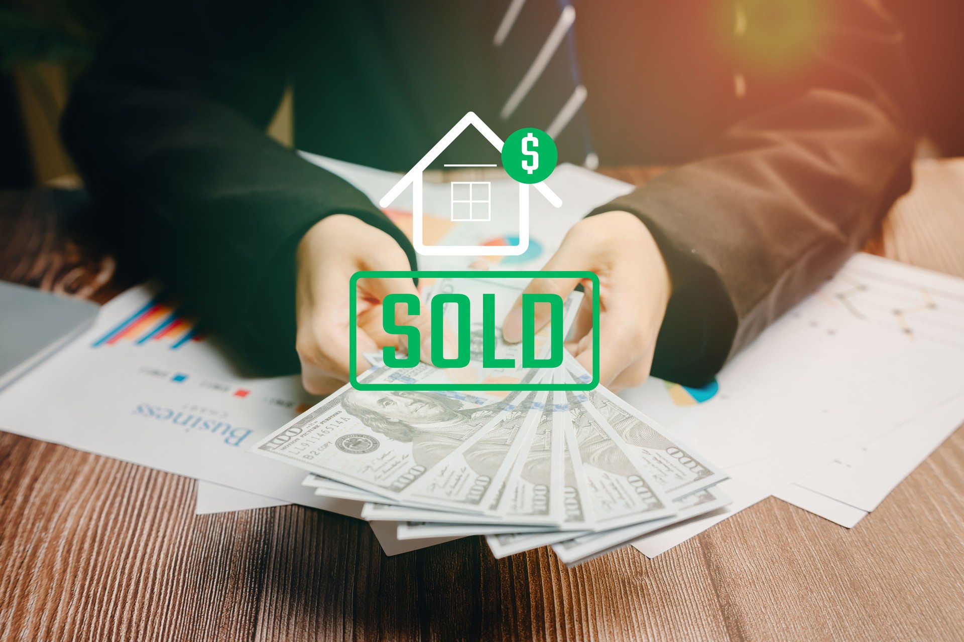 Sold concept. Business Transaction with Cash and Sold Sign for Real Estate Investment and Financial Success
